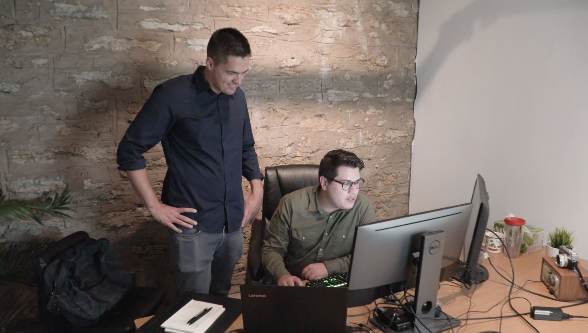 Two Web Designers working on user experience or user interface in office