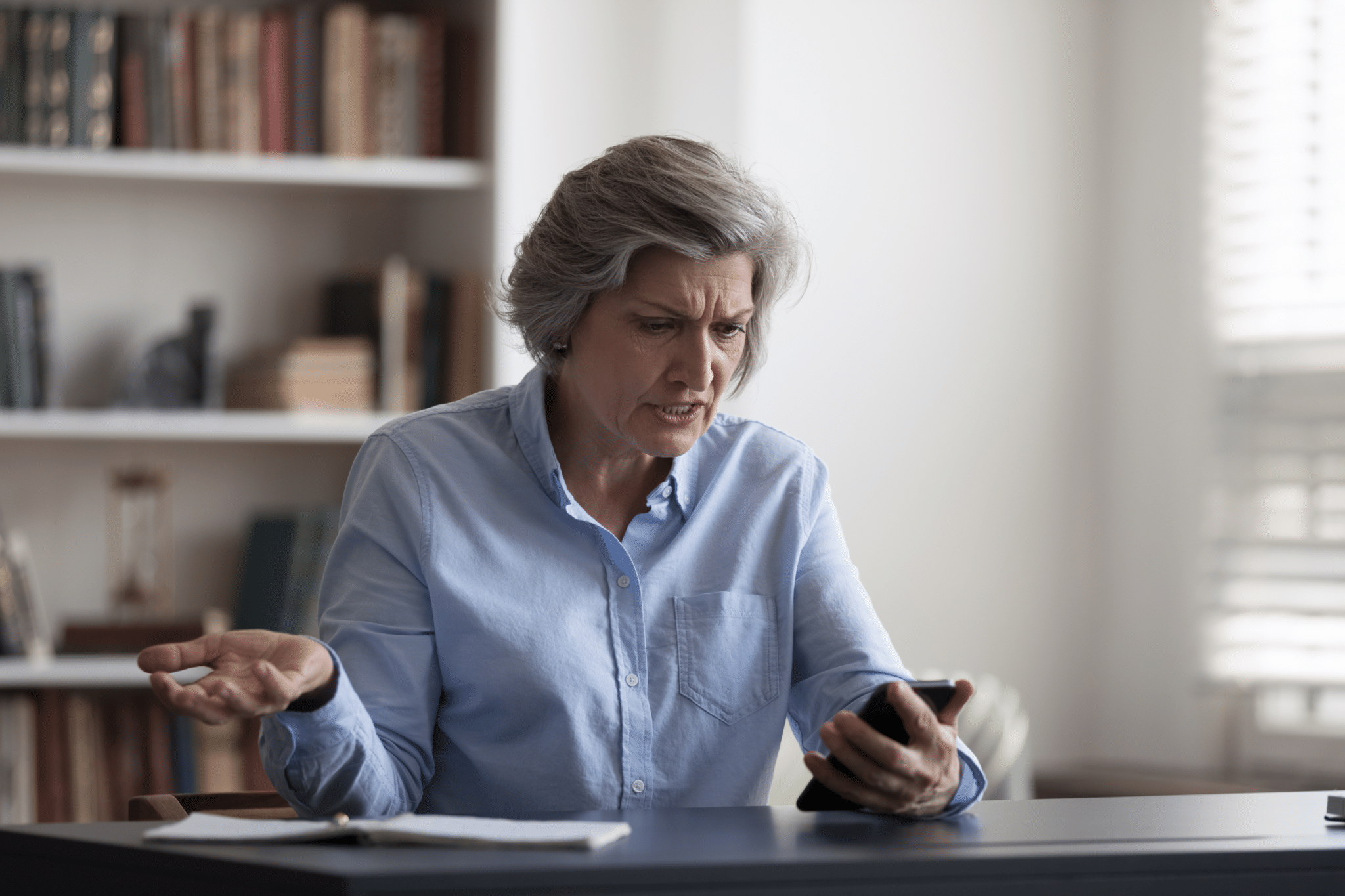 A customer service representative listening to a customer's concerns with empathy and compassion