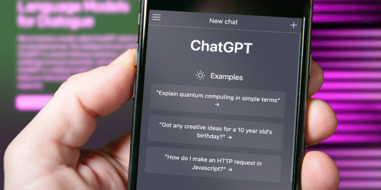 A hand holds a smartphone with the ChatGPT app open, showing prompts to drive user engagement and enhance website interaction.