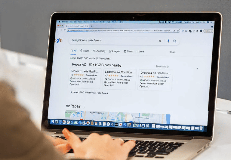 Local Service Ads - Person on Computer, Google Guaranteed