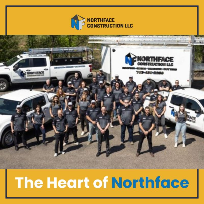 Northface Construction LLC team poses in front of branded trucks, company shirts on, "The Heart of Northface" captioned below.